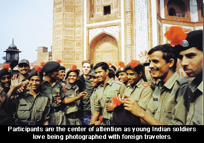 Participants are the center of attention as young Indian soldiers love being photographed with foreign travelers.